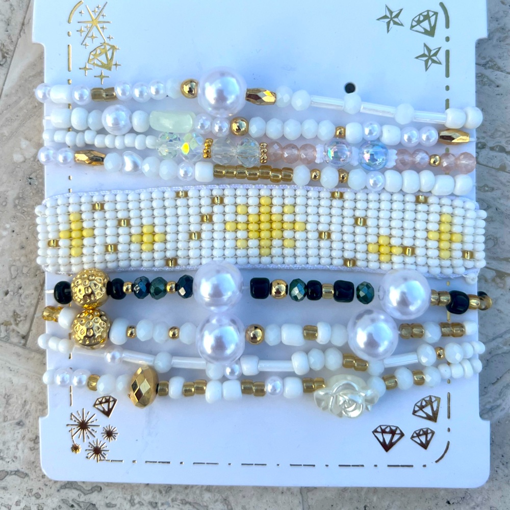 Handmade Colombian beaded white theme bracelets.